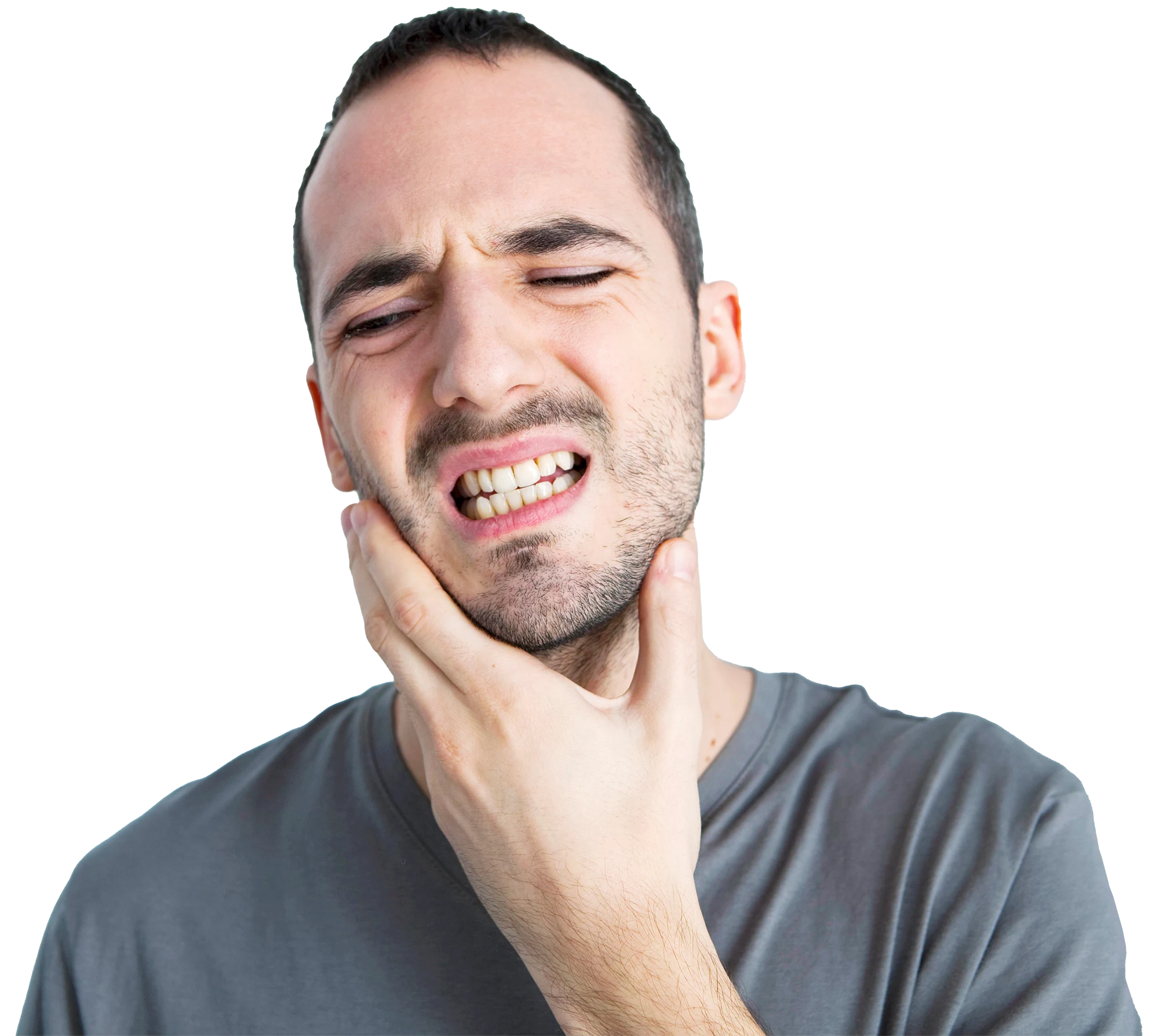 hombre sosteniendo su mandíbula debido al dolor de bruxismo